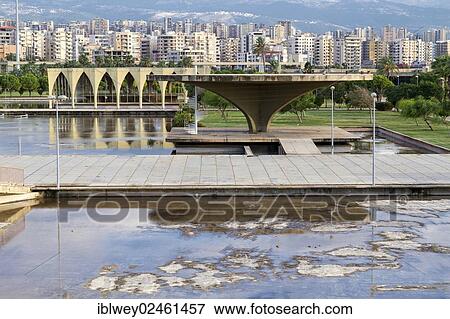 "Expo site, Rachid Karami International Fair, Tripoli, Lebanon. The Brazilian architect Oscar Niemeyer was planning the area in the early 1960s. Helicopter platform and Lebanese pavilion in front of the skyscrapers of Tripoli. " View Large Photo Image Stock Photo - "Expo site, Rachid Karami International Fair, Tripoli, Lebanon. The Brazilian architect Oscar Niemeyer was planning the area in the early 1960s. Helicopter platform and Lebanese pavilion in front of the skyscrapers of Tripoli. ". Fotosearch