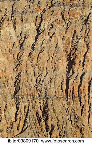 "Exposed fissured bedrock of orange-colored conglomerate on the crater wall of Ubehebe Crater, Death Valley, Death Valley National Park, California, USA" View Large Photo Image Stock Image - "Exposed fissured bedrock of orange-colored conglomerate on the crater wall of Ubehebe Crater, Death Valley, Death Valley National Park, California, USA". Fotosearch