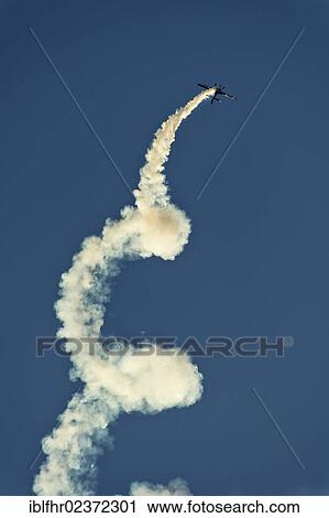"Extra 300S in front of a blue sky during an aerobatics display, Grevenbroich, North Rhine-Westphalia, Germany, Europe" View Large Photo Image Stock Image - "Extra 300S in front of a blue sky during an aerobatics display, Grevenbroich, North Rhine-Westphalia, Germany, Europe". Fotosearch