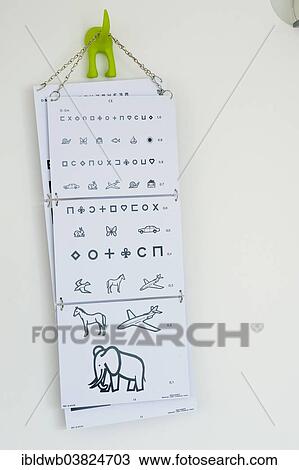 Stock Image - Eye test at a paediatric practice. Fotosearch