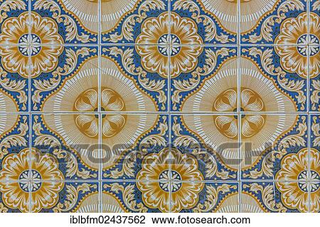 Stock Image - "Facade of a house decorated with tiles, Azulejos, Ferragudo, Algarve, Portugal, Europe". Fotosearch