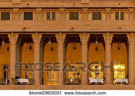 Stock Image - "Facade of the garden side with a restaurant, Palace Hotel, Umaid Bhawan Palace in the evening light, Jodhpur, Rajasthan, India, Asia". Fotosearch