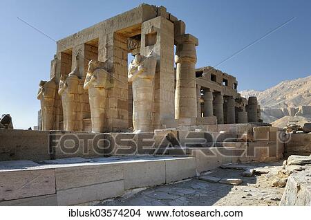 Picture - "Facade with columns and Osiris statues in front of the Ramesseum, mortuary temple of Pharaoh Ramesses II, Thebes, west bank, Luxor, Luxor Governorate, Egypt, Africa". Fotosearch