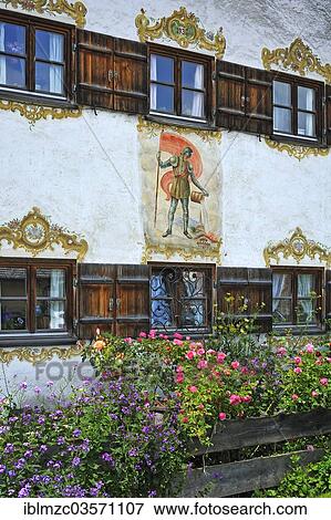 "Facade with windows with shutters, Lueftlmalerei mural of St. Florian from 1936 on a farmhouse, Durnbach, Upper Bavaria, Bavaria, Germany, Europe" View Large Photo Image Stock Photo - "Facade with windows with shutters, Lueftlmalerei mural of St. Florian from 1936 on a farmhouse, Durnbach, Upper Bavaria, Bavaria, Germany, Europe". Fotosearch