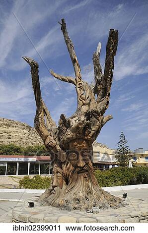 "Face carved in a tree by hippies, Matala, Crete, Greece, Europe" View Large Photo Image Stock Image - "Face carved in a tree by hippies, Matala, Crete, Greece, Europe". Fotosearch