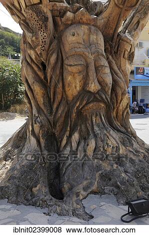 "Face carved in a tree by hippies, Matala, Crete, Greece, Europe" View Large Photo Image Stock Photo - "Face carved in a tree by hippies, Matala, Crete, Greece, Europe". Fotosearch