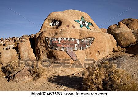 "Face painted on a rock, """"The Visible Man"""" in the Alabama Hills, Sierra Nevada, California, United States of America, USA" View Large Photo Image Stock Photo - "Face painted on a rock, """"The Visible Man"""" in the Alabama Hills, Sierra Nevada, California, United States of America, USA". Fotosearch
