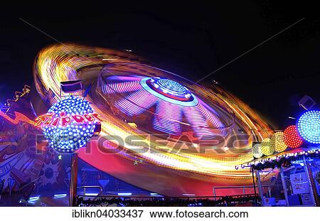 "Fairground ride, long exposure, Hamburger Dom funfair, Hamburg, Germany, Europe" View Large Photo Image Stock Photo - "Fairground ride, long exposure, Hamburger Dom funfair, Hamburg, Germany, Europe". Fotosearch