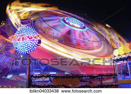"Fairground ride, long exposure, Hamburger Dom funfair, Hamburg, Germany, Europe" View Large Photo Image Stock Photo - "Fairground ride, long exposure, Hamburger Dom funfair, Hamburg, Germany, Europe". Fotosearch