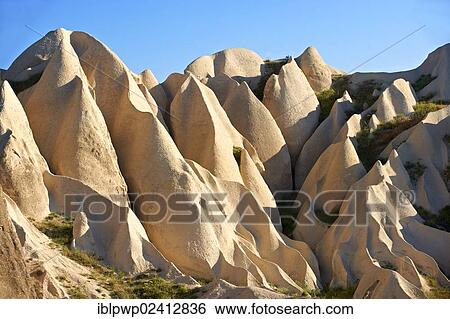 Fairy Chimney volcanic tuff rock formations, Goreme, Cappadocia, Turkey, Asia View Large Photo Image Stock Photograph - Fairy Chimney volcanic tuff rock formations, Goreme, Cappadocia, Turkey, Asia. Fotosearch