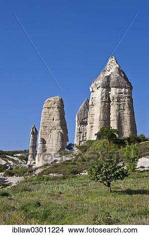 "Fairy Chimneys made of tufa in the Valley of Love near the World Heritage Site of Goereme, Love Valley, Goreme National Park, Cappadocia, Nevsehir Province, Central Anatolia Region, Turkey, Asia" View Large Photo Image Picture - "Fairy Chimneys made of tufa in the Valley of Love near the World Heritage Site of Goereme, Love Valley, Goreme National Park, Cappadocia, Nevsehir Province, Central Anatolia Region, Turkey, Asia". Fotosearch