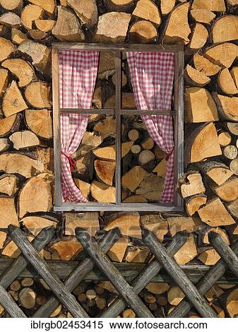 "Fake windows in a stack of firewood, Isny, Allgaeu, Germany, Europe" View Large Photo Image Stock Photography - "Fake windows in a stack of firewood, Isny, Allgaeu, Germany, Europe". Fotosearch