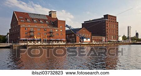 "Faktorei 21, Hafenforum and the Speicher Allgemeine or former general warehouse in the inner harbour, Duisburg, Ruhr district, North Rhine-Westphalia, Germany, Europe" View Large Photo Image Stock Image - "Faktorei 21, Hafenforum and the Speicher Allgemeine or former general warehouse in the inner harbour, Duisburg, Ruhr district, North Rhine-Westphalia, Germany, Europe". Fotosearch