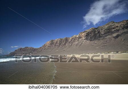 "Famara beach, Playa de Famara, with Risco de Famara, Lanzarote, Canary Islands, Spain, Europe" View Large Photo Image Stock Photography - "Famara beach, Playa de Famara, with Risco de Famara, Lanzarote, Canary Islands, Spain, Europe". Fotosearch
