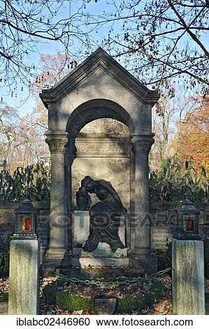 "Family grave with female statue on the Ostfriedhof or East Cemetery, Munich, Bavaria, Germany, Europe" View Large Photo Image Stock Image - "Family grave with female statue on the Ostfriedhof or East Cemetery, Munich, Bavaria, Germany, Europe". Fotosearch
