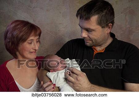 "Family portrait with baby, Germany, Europe" View Large Photo Image Stock Photo - "Family portrait with baby, Germany, Europe". Fotosearch