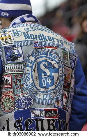 "Fan of FC Schalke 04 football club wearing a """"fan jacket"""", Mainz, Rhineland-Palatinate, Germany, Europe" View Large Photo Image Stock Image - "Fan of FC Schalke 04 football club wearing a """"fan jacket"""", Mainz, Rhineland-Palatinate, Germany, Europe". Fotosearch
