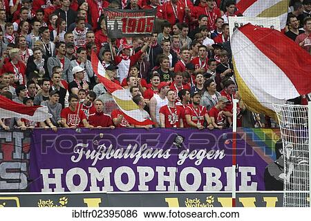 "Fans of FSV Mainz 05 football club showing a banner """"Fussballfans gegen Homophobie"""", German for """"football fans against homophobia"""", FSV Mainz 05 vs Fortuna Duesseldorf, Coface-Arena, Rhineland-Palatinate, Germany, Europe" View Large Photo Image Stock Photograph - "Fans of FSV Mainz 05 football club showing a banner """"Fussballfans gegen Homophobie"""", German for """"football fans against homophobia"""", FSV Mainz 05 vs Fortuna Duesseldorf, Coface-Arena, Rhineland-Palatinate, Germany, Europe". Fotosearch