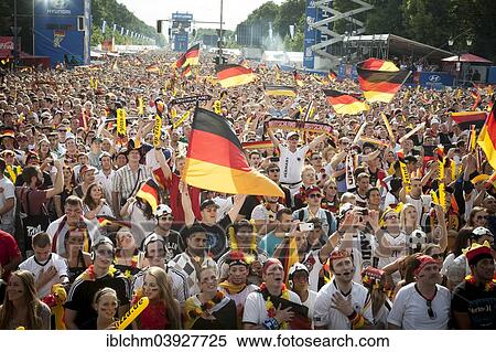 "Fans watch the first game of the German national team against Portugal, 2014 World Cup, public viewing at the Fan Park Berlin between the Brandenburg Gate and Victory Column, Berlin, Germany, Europe" View Large Photo Image Stock Photography - "Fans watch the first game of the German national team against Portugal, 2014 World Cup, public viewing at the Fan Park Berlin between the Brandenburg Gate and Victory Column, Berlin, Germany, Europe". Fotosearch
