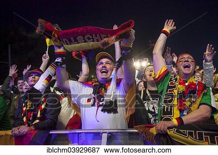 Stock Photo - "Fans watching the match Germany vs Ghana during the 2014 FIFA World Cup public screening event at Fanpark Berlin, Berlin, Germany, Europe". Fotosearch