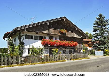 Stock Photo - "Farm, balcony with geraniums (Pelargonium), Aying, Bavaria, Germany, Europe". Fotosearch