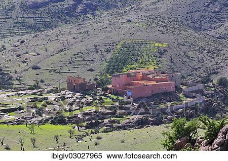 Stock Photography - "Farm with fields in a barren landscape, nahe Tizourgane, Souss-Massa-Draa, Antiatlas, Morocco, Africa". Fotosearch
