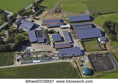 "Farm with solar panels on the roofs, aerial view, Fischerhutte, Steenfeld, Schleswig-Holstein, Germany, Europe" View Large Photo Image Stock Photo - "Farm with solar panels on the roofs, aerial view, Fischerhutte, Steenfeld, Schleswig-Holstein, Germany, Europe". Fotosearch