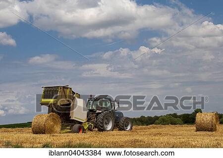 "Farmer with tractor in his field making straw bales, Palatinate Rhineland-Palatinate, Germany, Europe" View Large Photo Image Picture - "Farmer with tractor in his field making straw bales, Palatinate Rhineland-Palatinate, Germany, Europe". Fotosearch