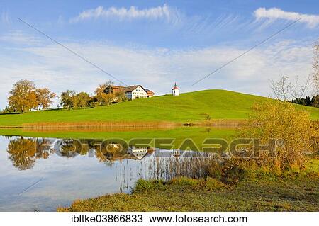 "Farmhouse with chapel at Hegratsrieder See lake, near Fussen, Allgau, Bavaria, Germany, Europe" View Large Photo Image Stock Image - "Farmhouse with chapel at Hegratsrieder See lake, near Fussen, Allgau, Bavaria, Germany, Europe". Fotosearch