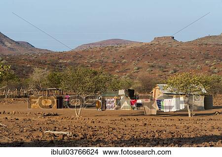 Picture - "Farmstead with laundry line in a dry landscape, Kunene Region, Namibia, Africa". Fotosearch
