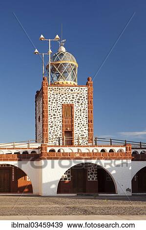 Stock Photo - "Faro de la Entallada lighthouse at Punta de la Entallada, Fuerteventura, Canary Islands, Spain, Europe". Fotosearch