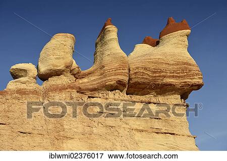 Stock Photo - "Fatali hoodoos, eroded hoodoos and rock formations of the Blue Mosquito Canyon, discoloured by minerals, Coal Mine Mesa, Painted Desert, Hopi Reservation, Navajo Nation Reservation, Arizona, Southwestern USA, USA". Fotosearch