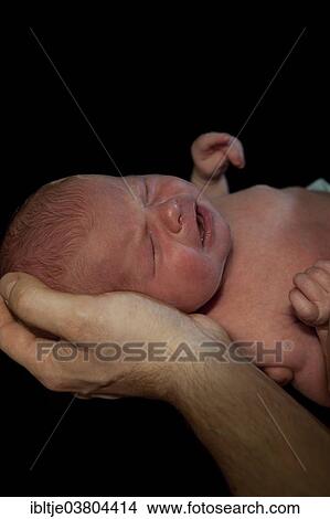 Father holding a baby View Large Photo Image Picture - Father holding a baby. Fotosearch