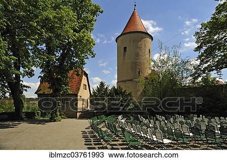 Stock Image - "Faulturm prison tower, round tower with a conical roof and embrasures, Dinkelsbuhl, Middle Franconia, Bavaria, Germany, Europe". Fotosearch