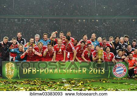 "FC Bayern celebrating their triple victory, team photo with the trophy, DFB Cup final 2013, FC Bayern Munich vs VfB Stuttgart in Berlin's Olympic Stadium, Berlin, Berlin, Germany, Europe" View Large Photo Image Stock Image - "FC Bayern celebrating their triple victory, team photo with the trophy, DFB Cup final 2013, FC Bayern Munich vs VfB Stuttgart in Berlin's Olympic Stadium, Berlin, Berlin, Germany, Europe". Fotosearch