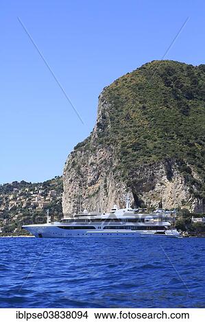 "Feadship motor yacht Lady Marina at anchor in front of Eze Bord de Mer, Maritime Alps, Provence Alpes Cote d'Azur, France, Europe" View Large Photo Image Picture - "Feadship motor yacht Lady Marina at anchor in front of Eze Bord de Mer, Maritime Alps, Provence Alpes Cote d'Azur, France, Europe". Fotosearch