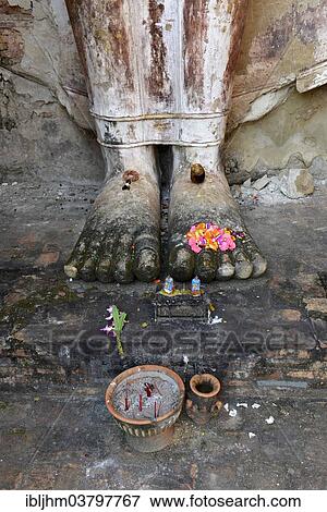 "Feet of the standing Buddha statue Phra Attharot, Wat Mahathat temple complex, Sukhothai Historical Park, Sukhothai, Northern Thailand, Thailand, Asia" View Large Photo Image Stock Photo - "Feet of the standing Buddha statue Phra Attharot, Wat Mahathat temple complex, Sukhothai Historical Park, Sukhothai, Northern Thailand, Thailand, Asia". Fotosearch