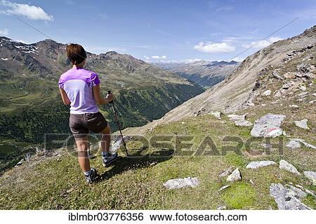 "Female climber during the ascent of Mt Schmied at Langtaufers in the Alta Val Venosta, Vallelunga or Langtaufers Valley at back, South Tyrol, Trentino-Alto Adige, Italy, Europe" View Large Photo Image Stock Photograph - "Female climber during the ascent of Mt Schmied at Langtaufers in the Alta Val Venosta, Vallelunga or Langtaufers Valley at back, South Tyrol, Trentino-Alto Adige, Italy, Europe". Fotosearch