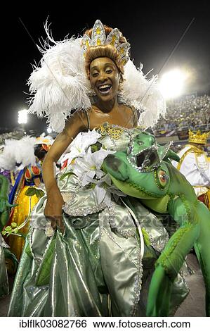 "Female dancer dressed in the costume of the princess from the fairy tale """"Frog King"""" by the Brothers Grimm, parade of the samba school Unidos da Tijuca, themed """"Enchanted Germany"""", Sambodromo, Rio de Janeiro, Brazil, South America" View Large Photo Image Stock Photograph - "Female dancer dressed in the costume of the princess from the fairy tale """"Frog King"""" by the Brothers Grimm, parade of the samba school Unidos da Tijuca, themed """"Enchanted Germany"""", Sambodromo, Rio de Janeiro, Brazil, South America". Fotosearch