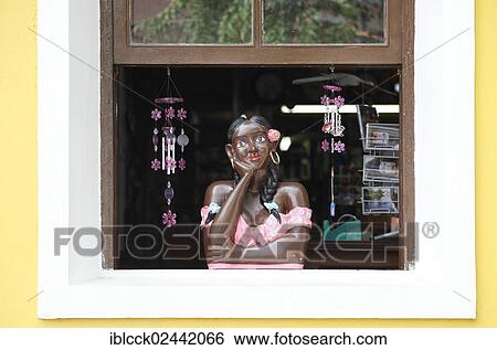 "Female figure at a window of a souvenir shop, Morretes, Parana, Brazil, South America" View Large Photo Image Stock Photograph - "Female figure at a window of a souvenir shop, Morretes, Parana, Brazil, South America". Fotosearch