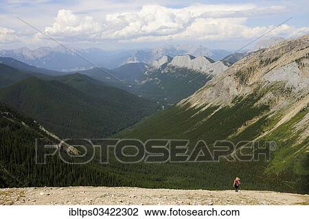 Stock Image - "Female hiker in the Rocky Mountains, Jasper National Park, Alberta Province, Canada, North America". Fotosearch