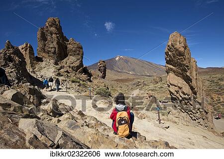 "Female hiker, Los Roques in the Parque Nacional del Teide, Tenerife, Canary Islands, Spain, Europe" View Large Photo Image Stock Photograph - "Female hiker, Los Roques in the Parque Nacional del Teide, Tenerife, Canary Islands, Spain, Europe". Fotosearch