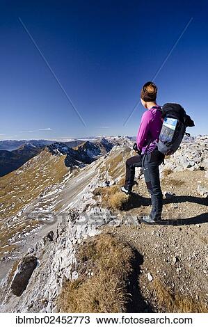 "Female hiker on Cima Campagnacia Mountain near the Bepi-Zac climbing route in the San Pellegrino Valley, overlooking the Dolomites, Trentino, Italy, Europe" View Large Photo Image Stock Image - "Female hiker on Cima Campagnacia Mountain near the Bepi-Zac climbing route in the San Pellegrino Valley, overlooking the Dolomites, Trentino, Italy, Europe". Fotosearch