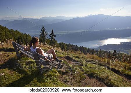 "Female hiker overlooking Lake Millstatt, Carinthia, Austria, Europe" View Large Photo Image Stock Image - "Female hiker overlooking Lake Millstatt, Carinthia, Austria, Europe". Fotosearch