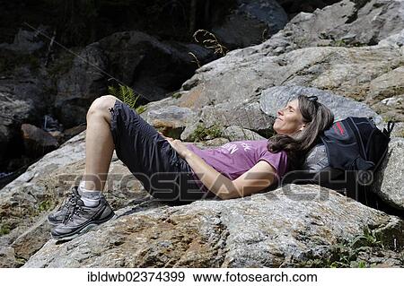 "Female hiker taking a break on the Zargenbach creek near Barbian, Eisack Valley, province of Bolzano-Bozen, Alto Adige, Italy, Europe" View Large Photo Image Stock Photo - "Female hiker taking a break on the Zargenbach creek near Barbian, Eisack Valley, province of Bolzano-Bozen, Alto Adige, Italy, Europe". Fotosearch