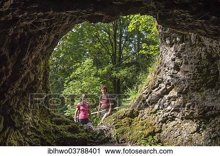 "Female hikers in front of the cave at Grosser Hermannstein rock, porphyry rock, Goethe-Trail, often visited by Goethe, Manebach, Thuringian Forest, Ilmenau, Thuringia, Germany, Europe" View Large Photo Image Stock Image - "Female hikers in front of the cave at Grosser Hermannstein rock, porphyry rock, Goethe-Trail, often visited by Goethe, Manebach, Thuringian Forest, Ilmenau, Thuringia, Germany, Europe". Fotosearch