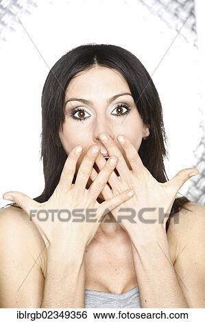 "Female model, hands in front of her face" View Large Photo Image Stock Photograph - "Female model, hands in front of her face". Fotosearch
