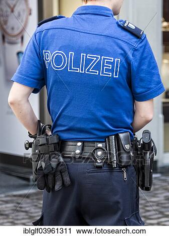 "Female Swiss police officer in uniform with equipment, from behind, Lucerne, Switzerland, Europe" View Large Photo Image Stock Image - "Female Swiss police officer in uniform with equipment, from behind, Lucerne, Switzerland, Europe". Fotosearch