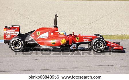 Stock Photograph - "Fernando Alonso in the Ferrari F14 T, Formula 1 winter testing at the Circuito de Velocidad, Jerez de la Frontera, Andalusia, Spain, Europe". Fotosearch