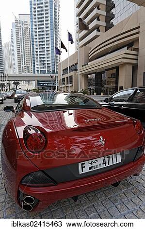 Ferrari parked in front of the luxury hotel Grosvenor House, Dubai Marina district, Dubai, United Arab Emirates, Middle East, Asia View Large Photo Image Stock Image - Ferrari parked in front of the luxury hotel Grosvenor House, Dubai Marina district, Dubai, United Arab Emirates, Middle East, Asia. Fotosearch